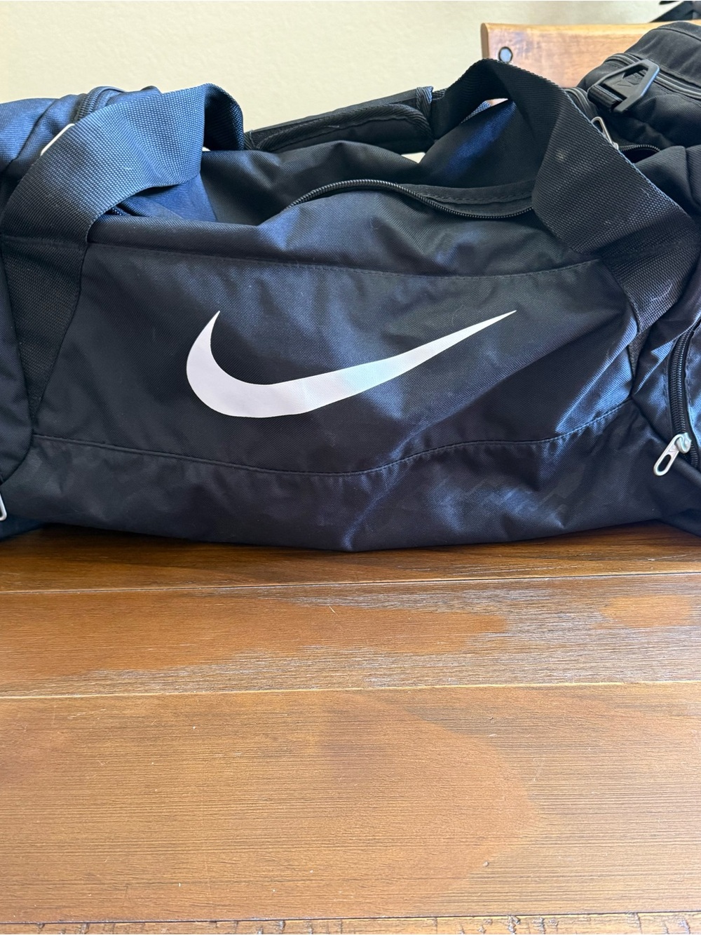 Nike Black Duffel Bag with White Swoosh